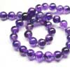 Natural Purple Amethyst Smooth Polished Round Ball Beads Length is 14 Inches and Size is 7mmPronounced AM-eth-ist, this lovely stone comes in two color variations of Purple and Pink. This gemstones belongs to quartz family. All strands are hand picked. 